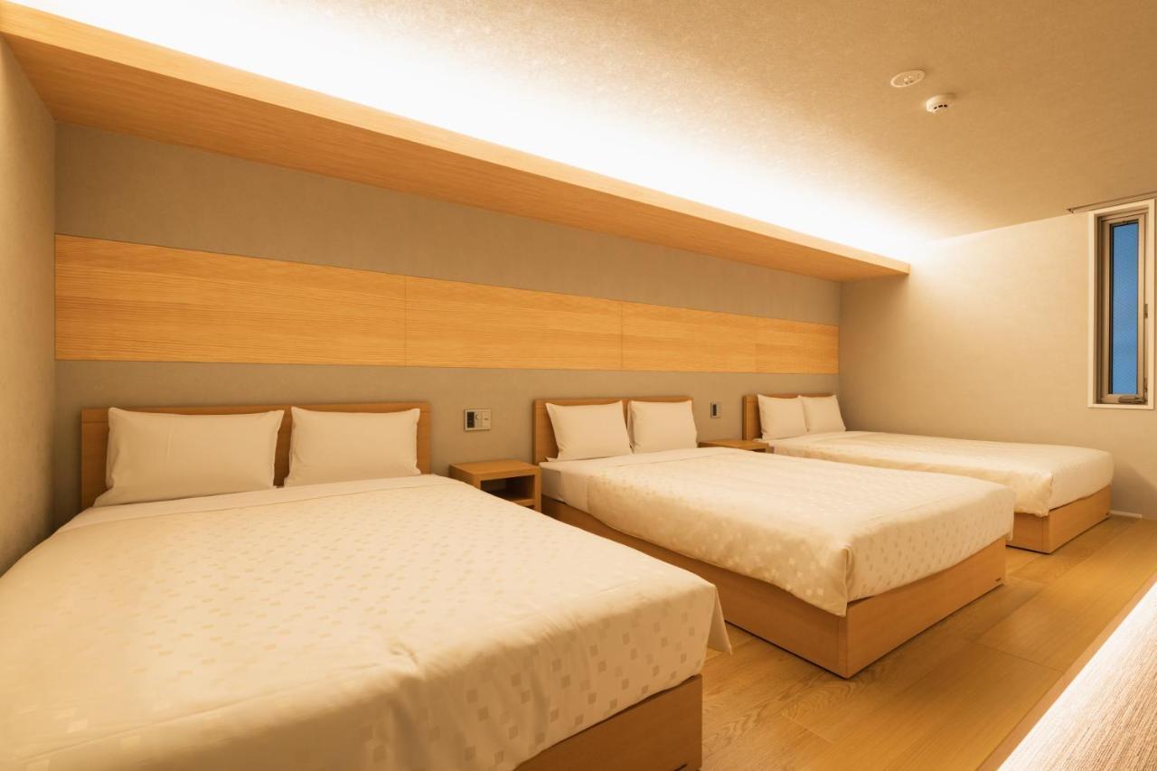 Grand Base Hakata Station Lejlighedshotel Fukuoka  Eksteriør billede